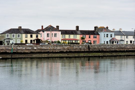 Buildings lining a portion of Dungarvan Harbor in Dungarvan, County Waterford, Ireland.