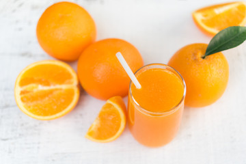 Glass of fresh orange juice from top view