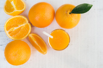 Glass of fresh orange juice from top view