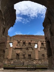 Ancient Roman Baths of Caracalla in Rome Italy.  Blue skies on a hot summer's day.  Site of the...