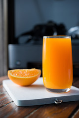 Freshly squeezed orange juice,orange juice on desk
