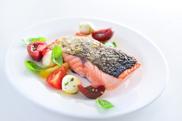 Salmon steak and salad