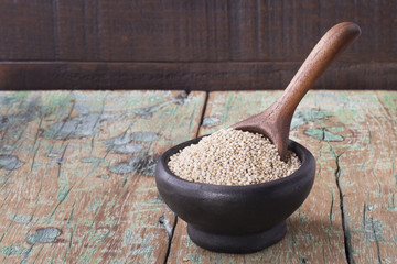 Grains of quinoa on wood - Chenopodium quinoa