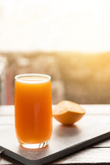 Freshly squeezed orange juice,orange juice on desk,orange juice breakfast