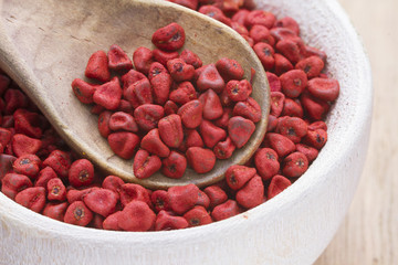 Seeds of achiote, originating from central america and parts of south america is used to season food