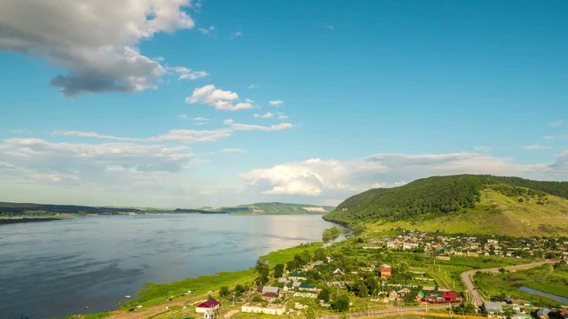 View of the village of Shiryaevo, on the river Volga and Zhiguli mountains. TimeLapse.