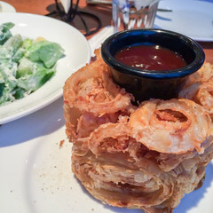 Fried onion served with ketchup
