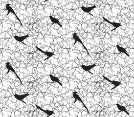 Seamless pattern with branches, thorns and birds.