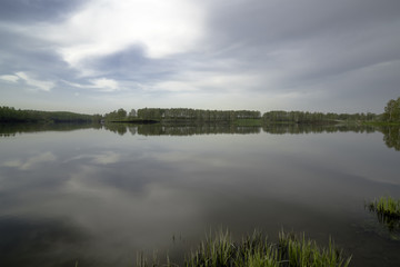 Fototapeta premium Morning spring landscape on the lake.
