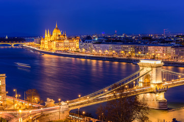 Fototapeta na wymiar Aerial view of Budapest at night. Hungarian landmarks: Chain Bridge, Parliament and Danube river in Budapest. 