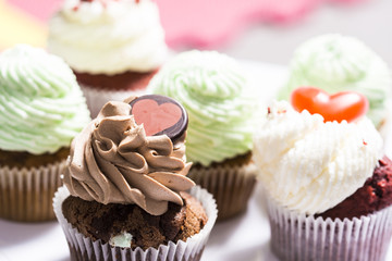 Some muffins cupcakes handmade on a white plate