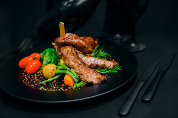 Grill meat and vegetables