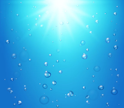 Fizzing air bubbles on blue underwater shiny background. Sea sparkles