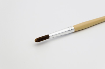 The paint brush isolated on the white background