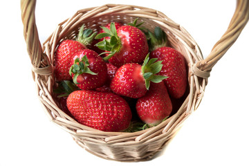 Strawberry in a basket on a white background