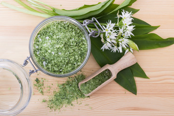 herbal salt and wild garlic / Green herbal salt of wild garlic and wooden spoon
