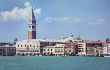 Fototapeta premium Famous San Marco tower and Doge's palace waterfront in Venice, Italy,