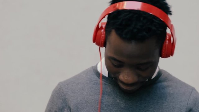 African american man listen music with headphones
