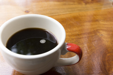 Morning coffee on wooden.
