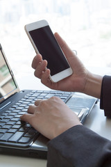 Business people using mobile phone technology. Typing smartphone screen. business man hands busy using cell phone at office desk, young male student typing on phone sitting at wooden table, 