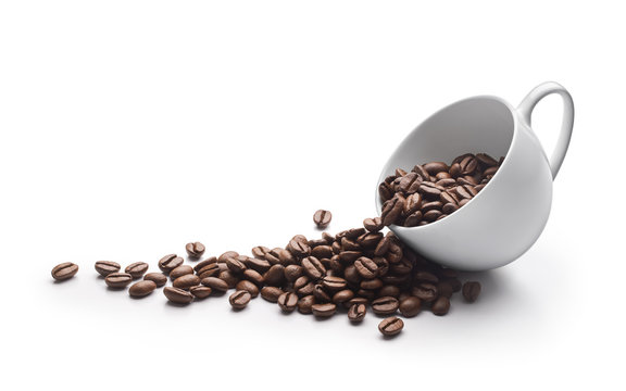Fototapeta Coffee beans in coffee cup isolated on white background