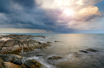 Sea stone and rock in sunrise time.