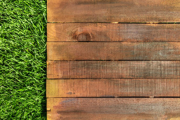 Wooden board on green grass, picnic related design template