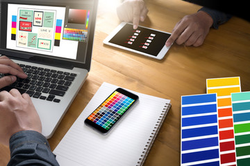 Fototapeta na wymiar Creative Designer Graphic at work. Color swatch samples, Illustrator Graphic designer working digital tablet and computer