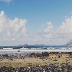 Fototapeta na wymiar Famara beach Lanzarote with Graciosa island in the background