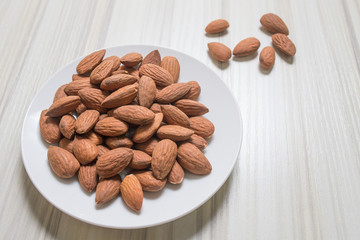 almond nut on wood table image