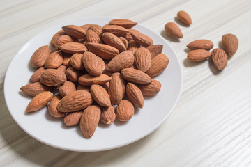 almond nut on wood table image