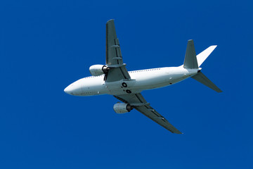  flying airplane on a clear sunny day