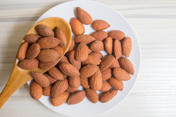 almond nut on wood table image