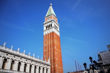 Fototapeta na wymiar San Marco Campanile and beautiful palace in Piazza San Marco, St Mark's Square, Venice, Italy