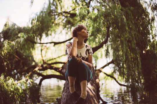 Girl sitting in park 