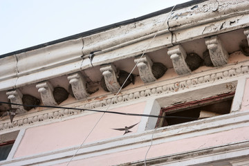 Urban swallows (Delichon urbicum) nesting under the roof. Zhovkva, Lviv region, Ukraine