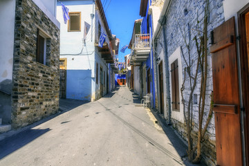Fototapeta na wymiar Narrow stone street in Kato Lefkara village. Larnaca District, Cyprus.