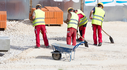 Construction workers at building site
