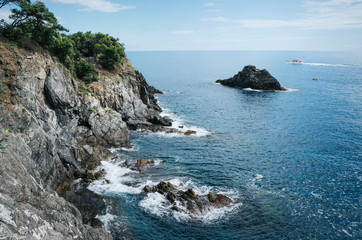 Fototapeta na wymiar Picturesque scene of cliffs in the sea.