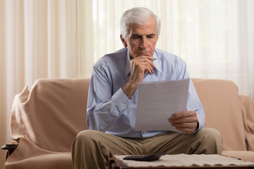 Older man doing his taxes