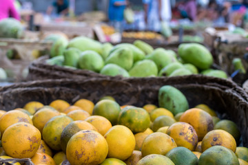 Fresh mandarin oranges on an organic food market of tropical Bali island, Indonesia. Mandarin background.