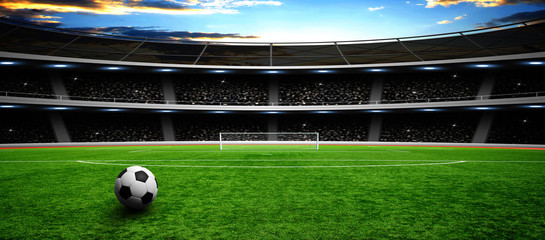 Obraz na płótnie Canvas Soccer ball on green stadium