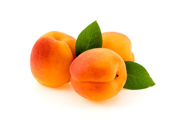 Ripe apricot with leaves isolated