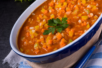 fish with vegetables in tomato sauce