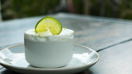 Lime frozen souffle on wooden background