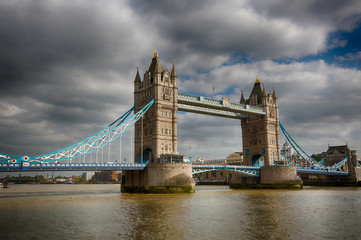 Daytime View of the West Side of Tower Bridge, London, England, UK from the North Side of The River Thames looking East.  HDR Image made from 3 exposures.
