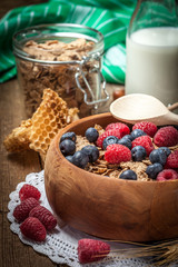 Tasty breakfast with milk and fruit.