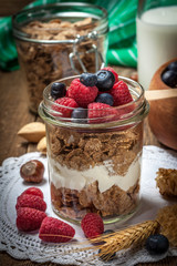 Tasty breakfast with milk and fruit.