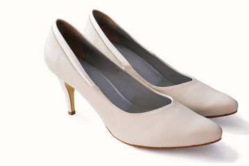 White leather high heels isolated on white background.