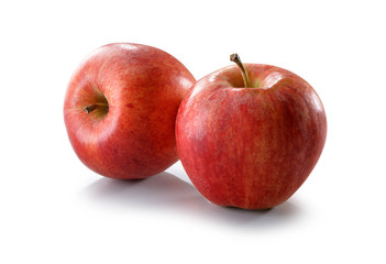 Two red apples close-up isolated on white background